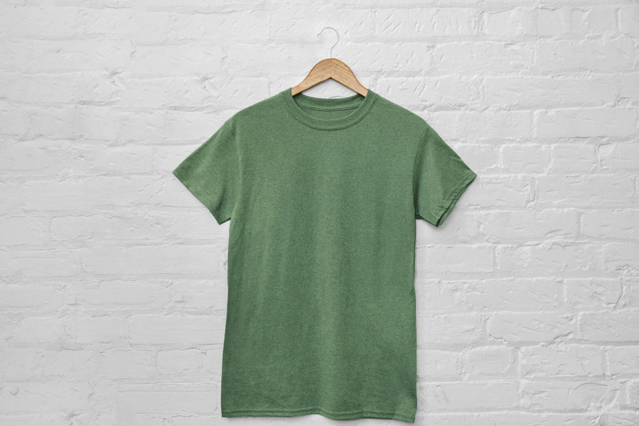 Green T shirt on hanger